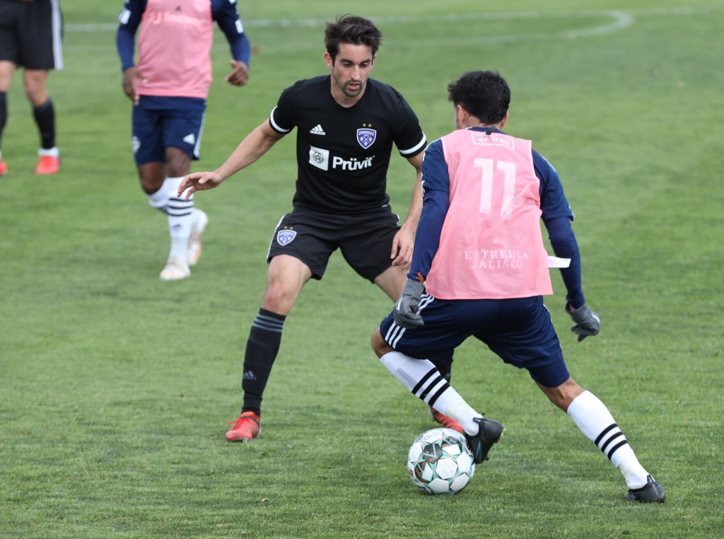 game action between Louisville City FC and El Paso Locomotive