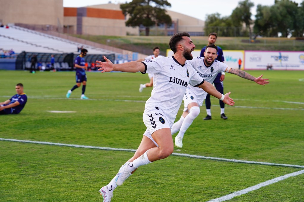 Las Vegas Lights defender Fabian Garcia celebrating a goal.