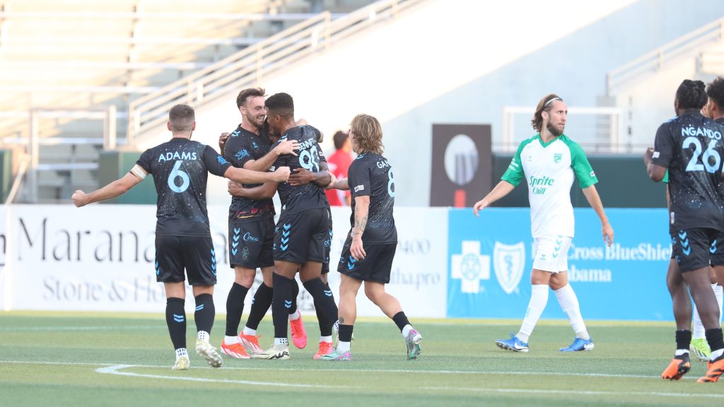 Las Vegas Lights FC players celebrating a goal