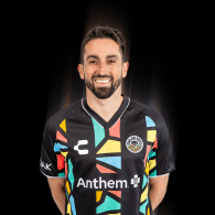 Tyler Gibson wearing an Oakland Roots SC 2025 Primary Kit.