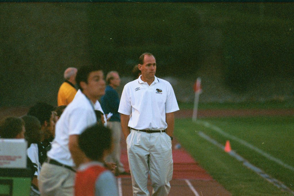 Picture of the only hall of fame induction of the 2022 season for the Pittsburgh Riverhounds, Gene Klein walking along the sidelines while coaching the Riverhounds to a win