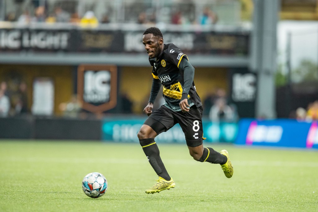 Riverhounds wing back Junior Etou dribbles the ball up the field in the team's 1-0 win over Miami FC on May 4, 2024 at Highmark Stadium in Pittsburgh. (Photo: Mallory Neil/Riverhounds SC)