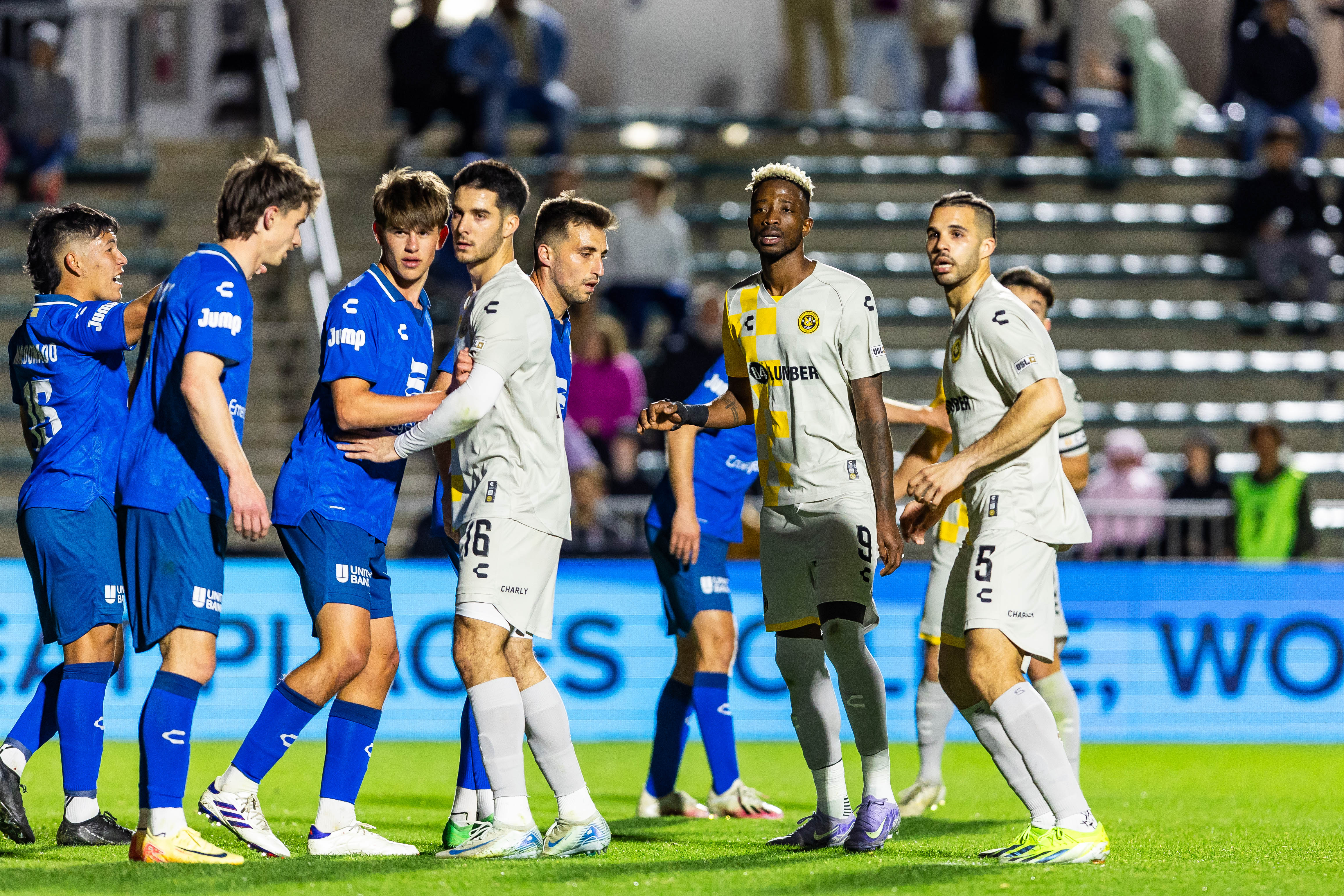 Riverhounds players (from left) Beto Ydrach, Augi Williams and Sean Suber prepare for a corner kick in the team's 1-1 draw at North Carolina FC on March 8, 2025 at WakeMed Soccer Park in Cary, N.C. (Photo: Mallory Neil/Riverhounds SC)