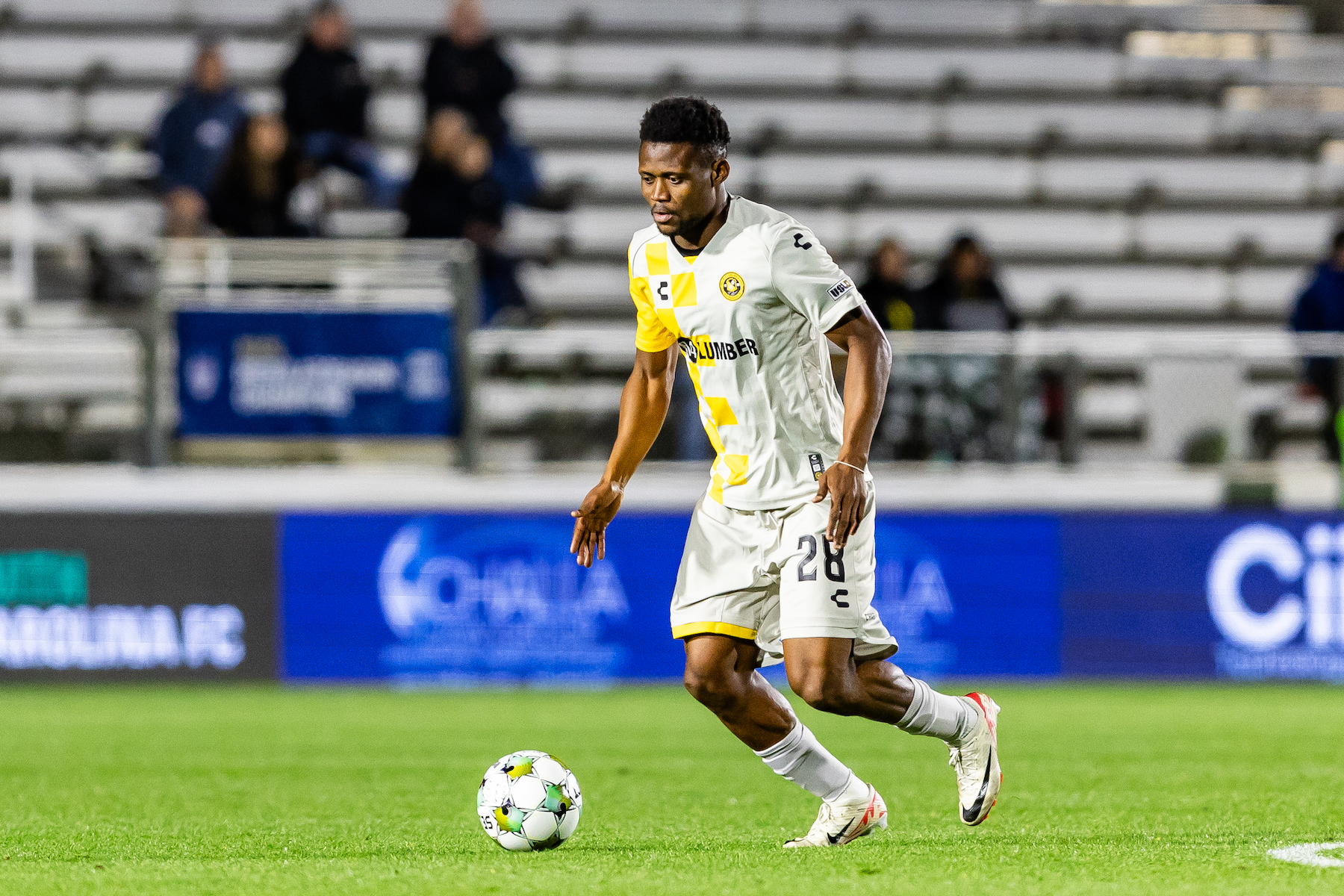 Riverhounds defender Illal Osumanu dribbles the ball in the team's 1-1 draw at North Carolina FC on May 8, 2025 at WakeMed Soccer Park in Cary, N.C. (Photo: Mallory Neil/Riverhounds SC)