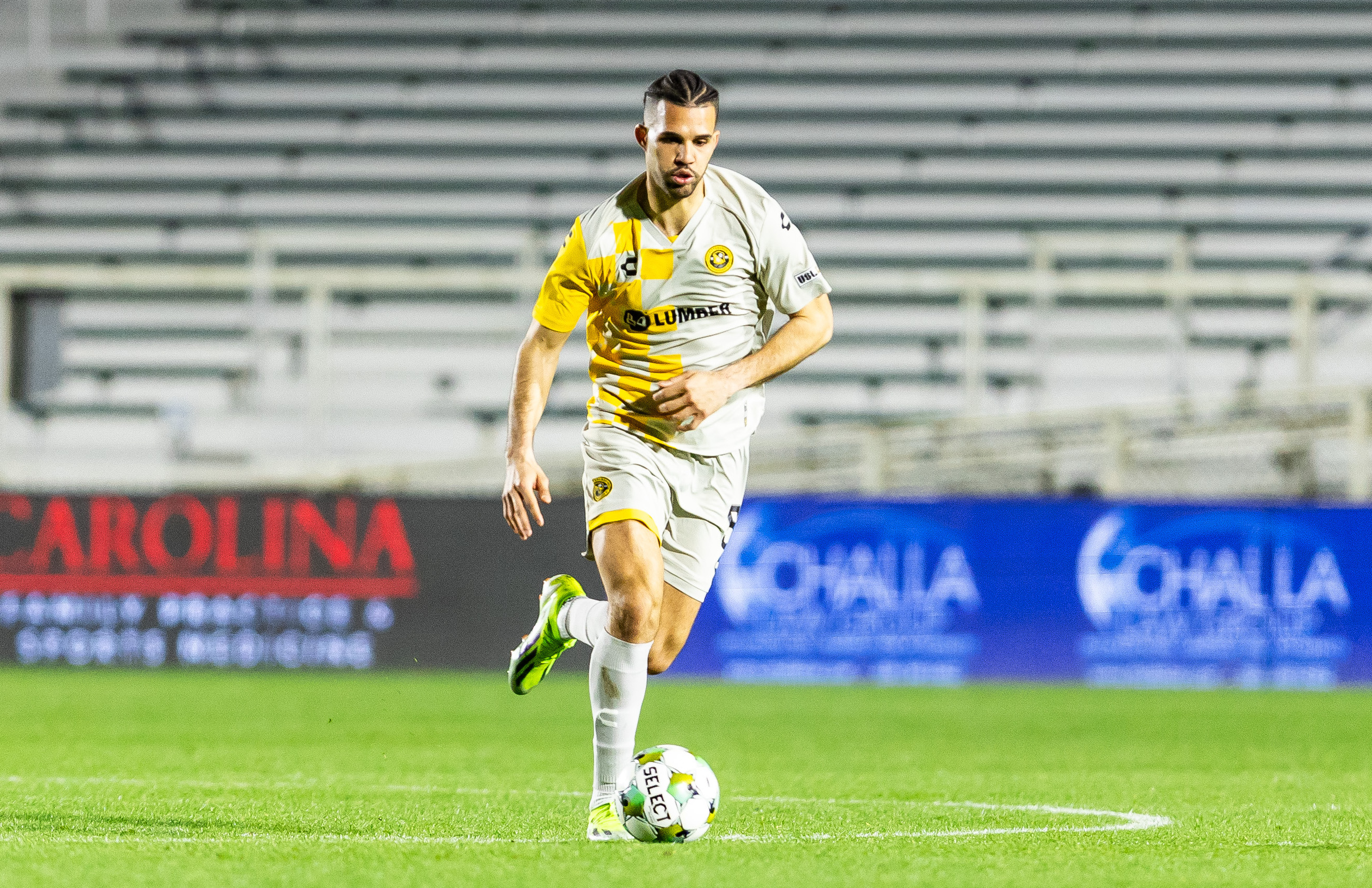 Sean Suber dribbles the ball during the Riverhounds' season-opening match against North Carolina FC on March 8, 2025 at WakeMed Soccer Park in Cary, N.C. (Photo: Mallory Neil/Riverhounds SC)