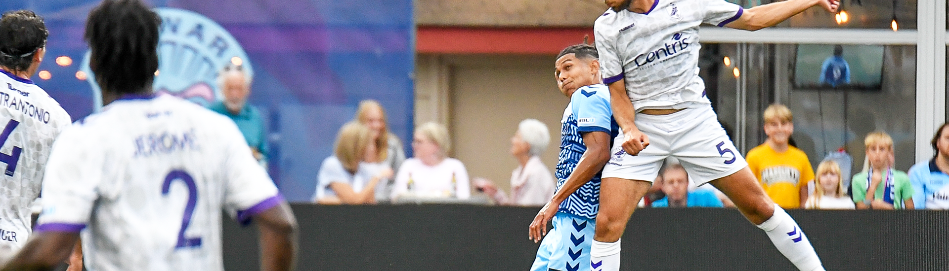 Marco Milanese heading the ball vs Madison