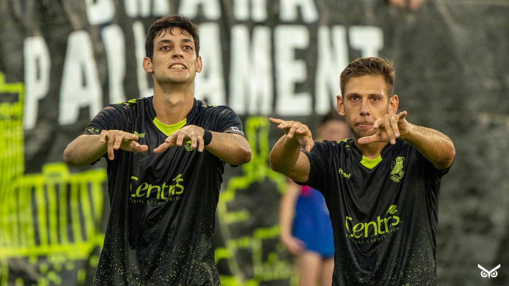 Pedro Dolabella and Marco Milanese celebrating a goal