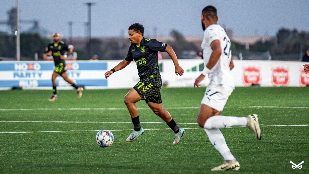 Zeiko Lewis carrying the ball vs Hailstorm
