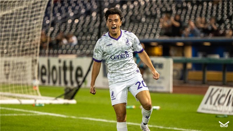 Charlie Ostrem celebrating