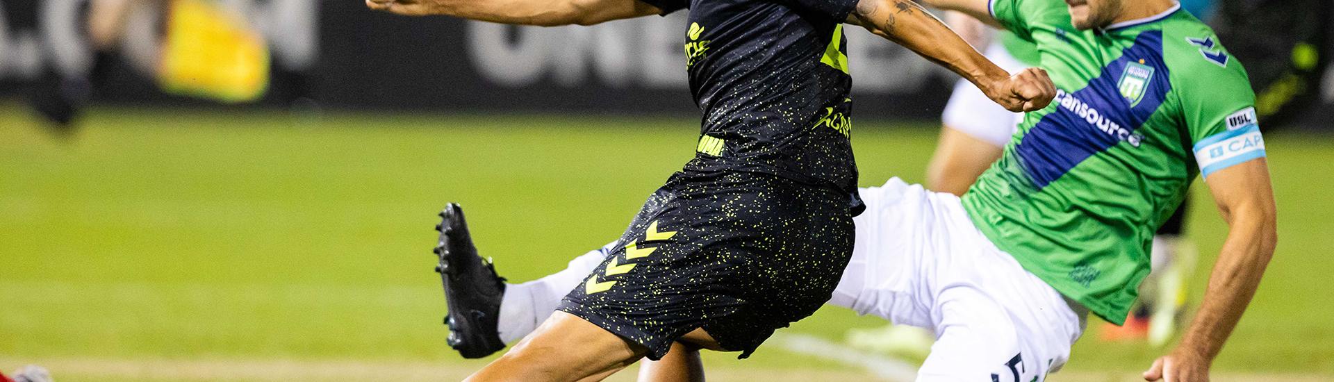 Aarón Gómez striking the ball against Greenville Triumph